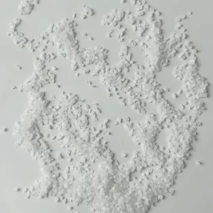 White corundum used in refractory applications for high-temperature resistance and durability.